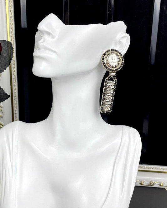 18K Chanel Leather Earrings