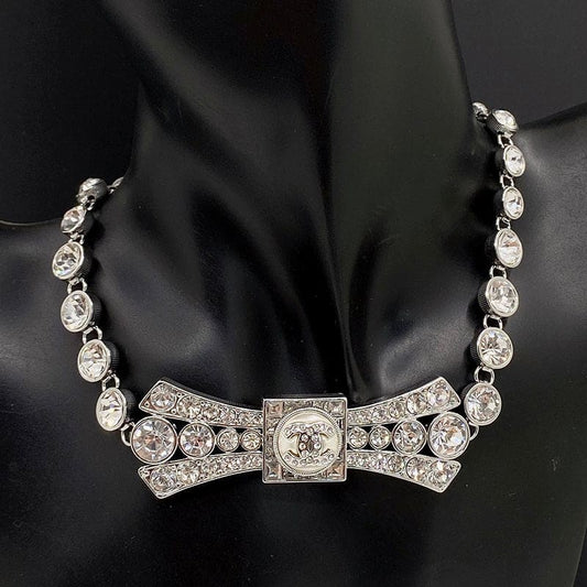 18K Chanel Diamond Bow Tie Pendant Necklace