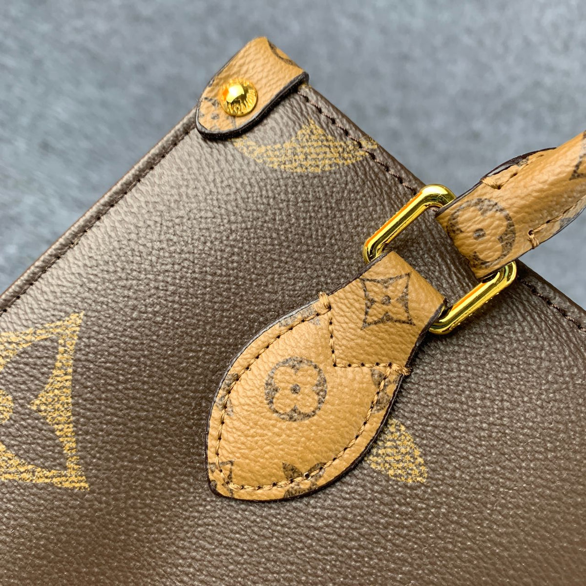 LV ONTHEGO GM GIANT REVERSE BROWN