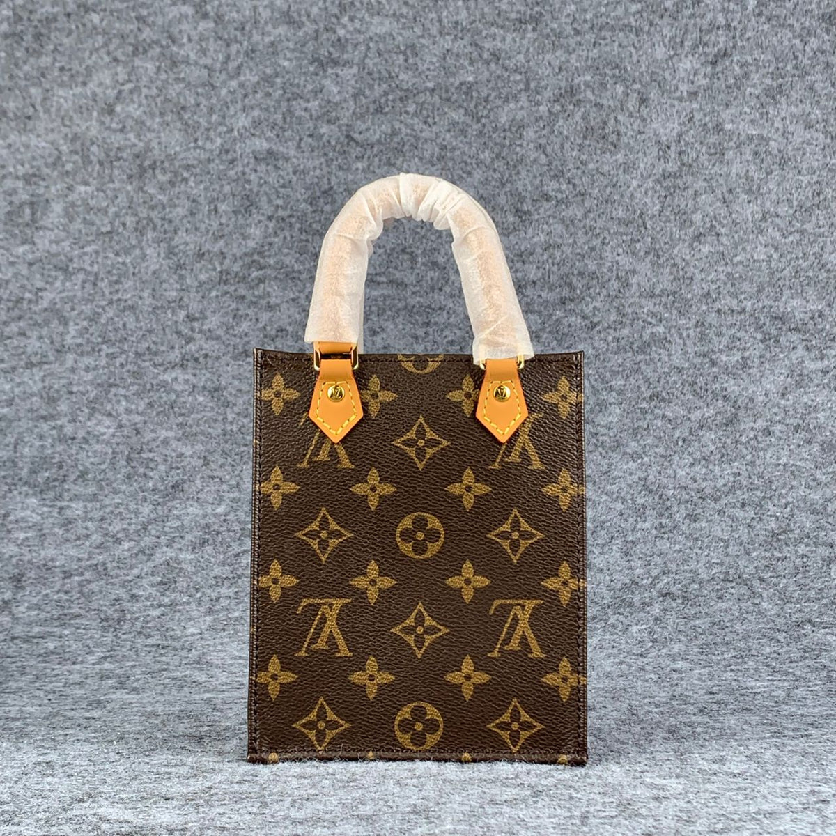 LV PETIT SAC PLAT BROWN