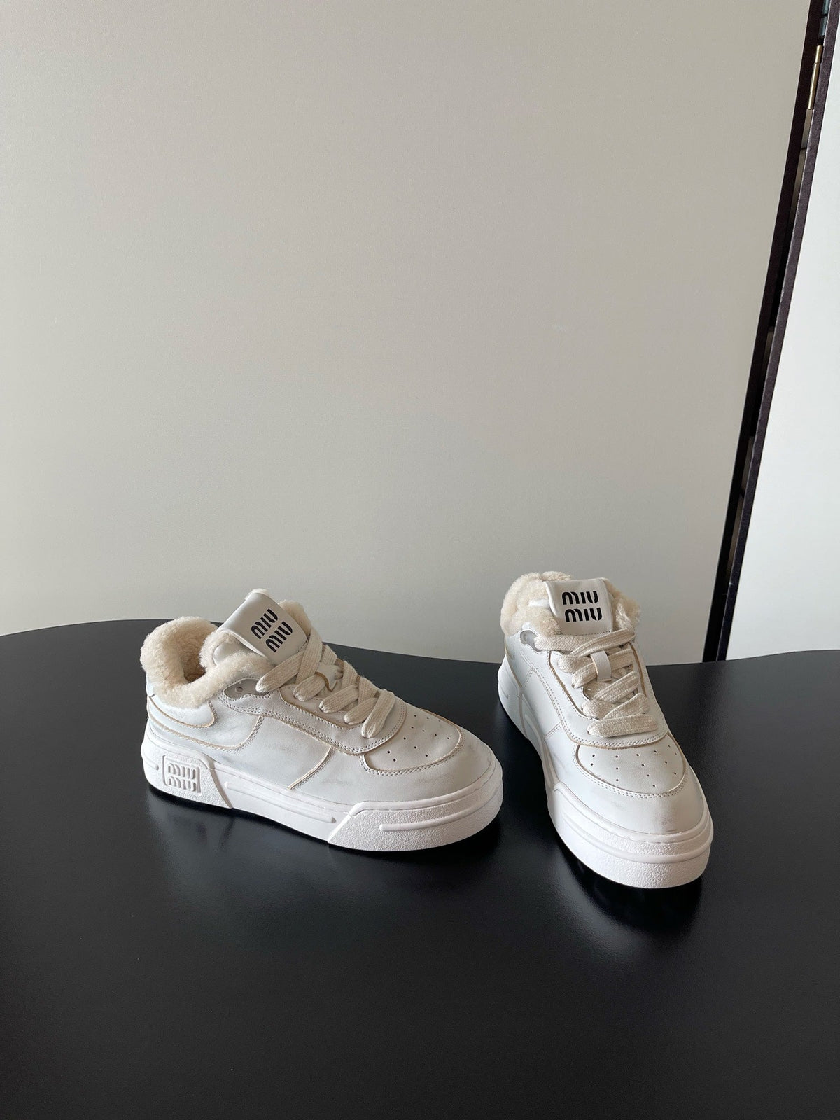 Miu Miu Distressed Retro German Training Sneakers