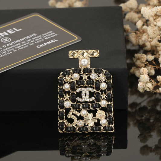 18K Chanel Bottle Strass Brooch