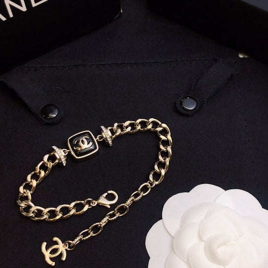 18K Chanel Black Logo Gold Chain Bracelet