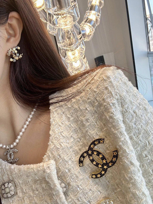 18K Chanel Black Star Brooch