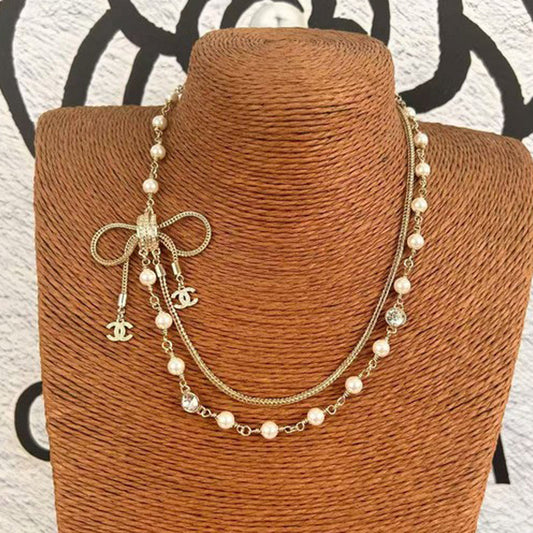 18K Chanel Bow Tie Pearl Necklace