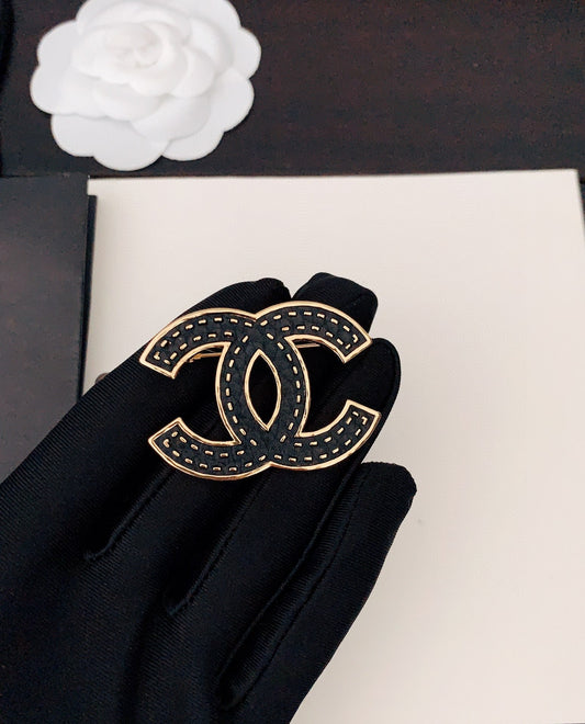18K Chanel Black Brooch