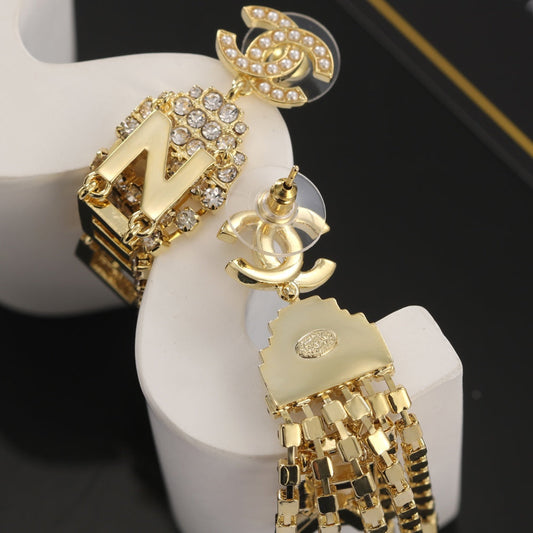 18K Chanel Letter Earrings